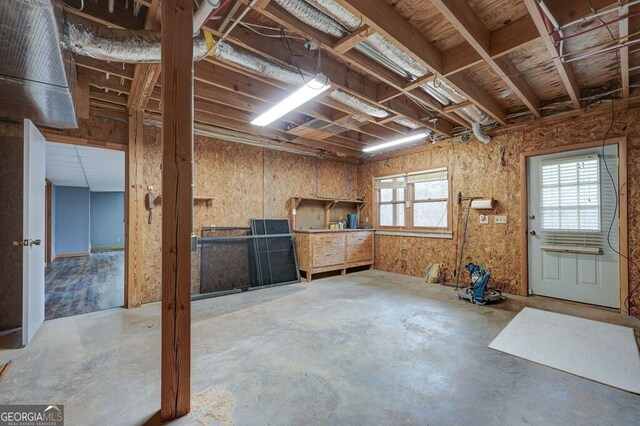 basement featuring plenty of natural light