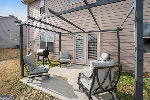 view of patio with a pergola and grilling area