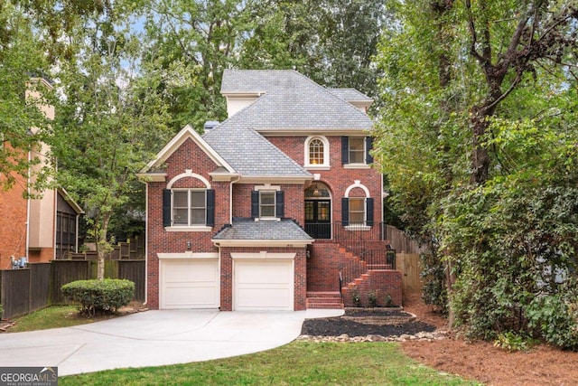 view of front of property with a garage