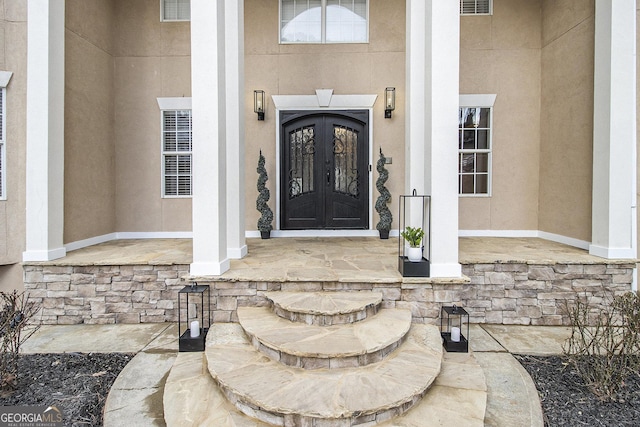 doorway to property featuring french doors