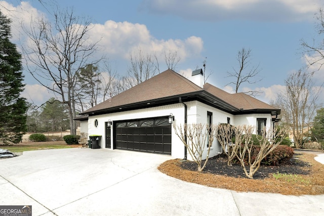 view of home's exterior featuring a garage