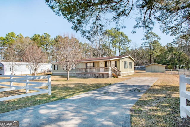 view of front of house with a front lawn and a porch