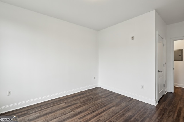 840 United Ave SE Unit 411, Atlanta, GA 30312 - empty room with dark wood-type flooring and electric panel