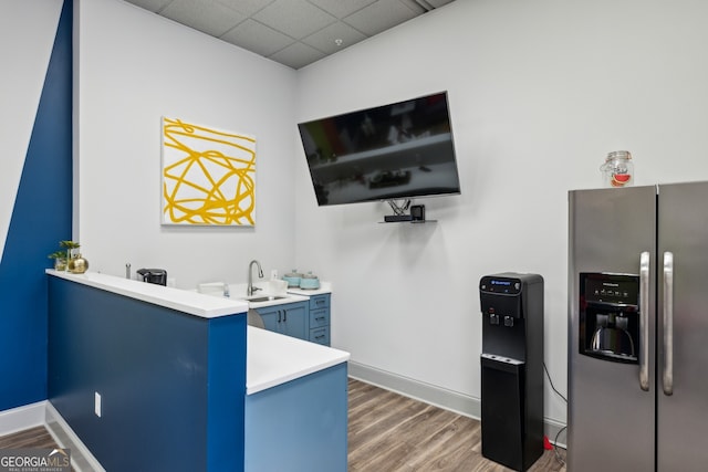 840 United Ave SE Unit 411, Atlanta, GA 30312 - kitchen featuring stainless steel refrigerator with ice dispenser, sink, a drop ceiling, and dark hardwood / wood-style flooring
