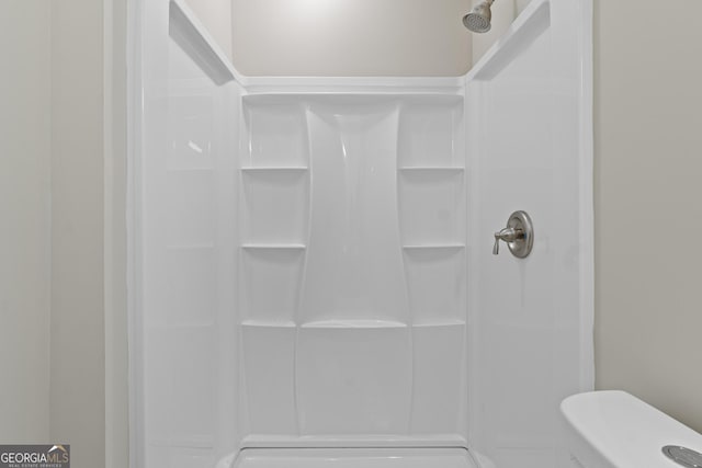 bathroom with a stall shower