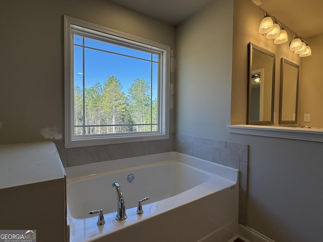 bathroom with a garden tub