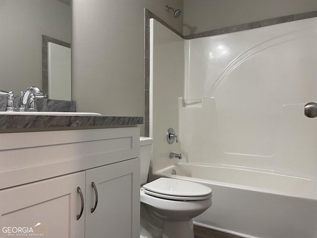 full bathroom featuring toilet, shower / bath combination, and vanity