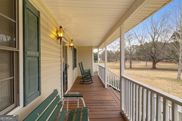 wooden terrace with covered porch