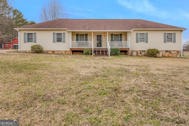 back of property featuring crawl space, a shingled roof, a porch, and a yard