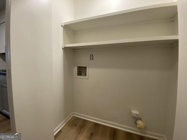 laundry room featuring hardwood / wood-style floors and hookup for a washing machine