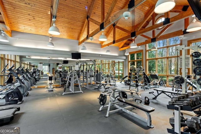 exercise room featuring vaulted ceiling and wooden ceiling