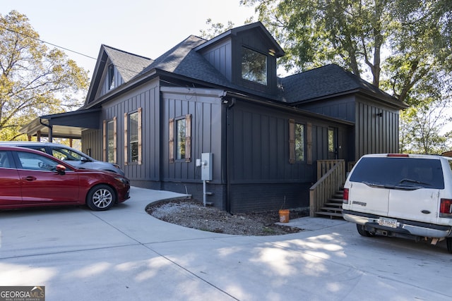 view of property exterior with a carport