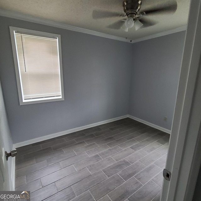 empty room with ornamental molding, a textured ceiling, and ceiling fan