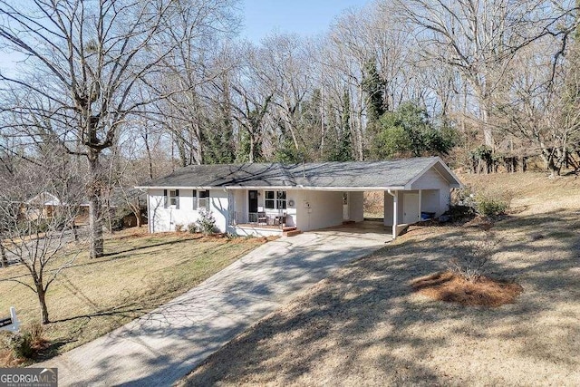 single story home with a carport and a front yard