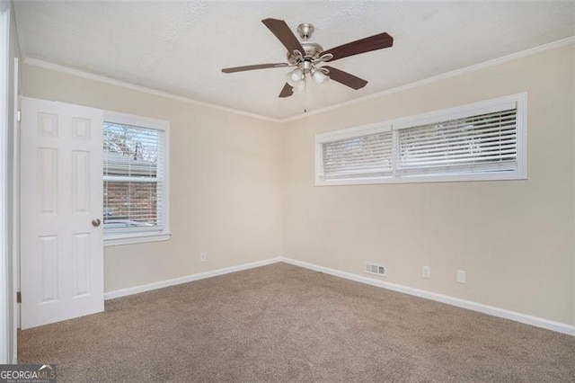 1146 Canal St, Decatur, GA 30032 - carpeted empty room with crown molding and ceiling fan