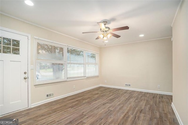 1146 Canal St, Decatur, GA 30032 - unfurnished room featuring ornamental molding, dark hardwood / wood-style floors, and ceiling fan