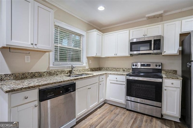 1146 Canal St, Decatur, GA 30032 - kitchen with white cabinetry, stainless steel appliances, and sink