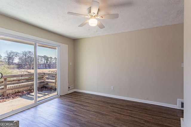 3517 Hyland Dr, Decatur, GA 30032 - spare room with ceiling fan, dark hardwood / wood-style floors, and a textured ceiling