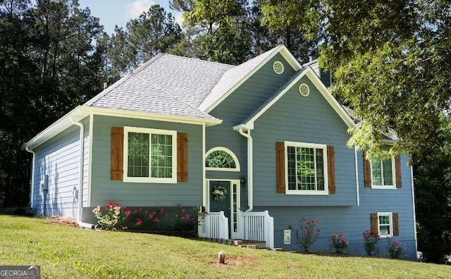 view of front of home with a front yard