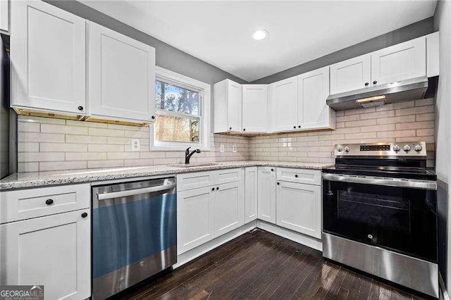 kitchen with white cabinetry, appliances with stainless steel finishes, and sink