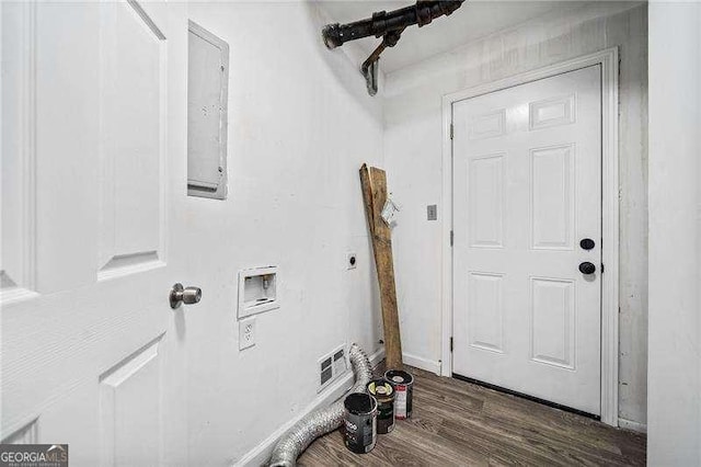 interior space with washer hookup, hookup for an electric dryer, and dark hardwood / wood-style flooring