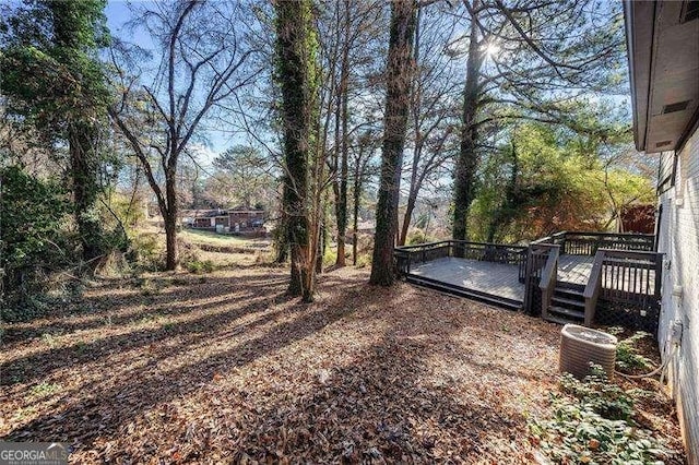 view of yard with a deck