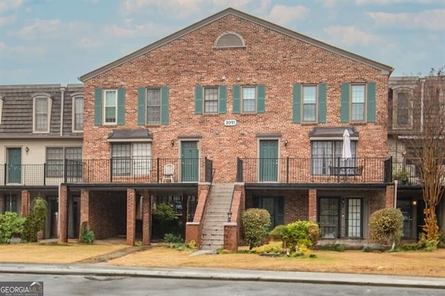 view of property with stairway