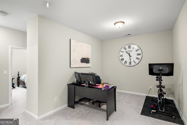 view of carpeted home office