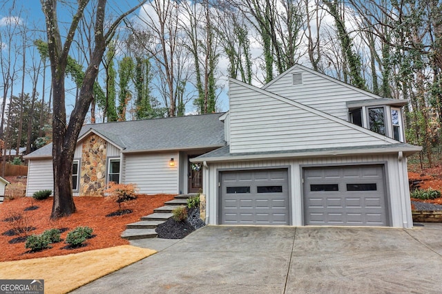 view of front of property featuring a garage