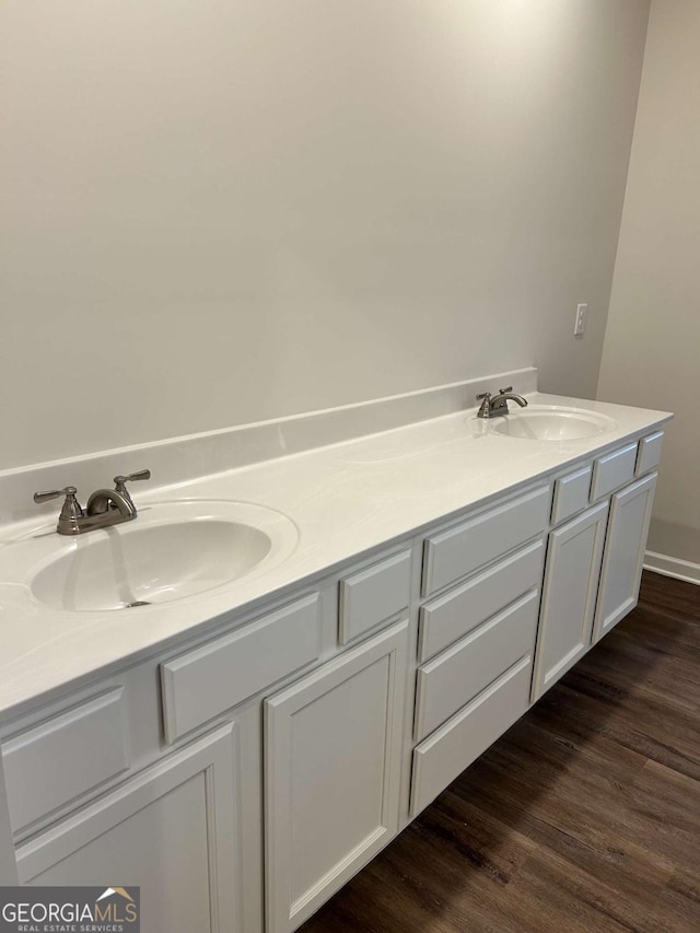 16 Wildflower Ln Unit 39, Dallas, GA 30132 - bathroom featuring double vanity and wood finished floors