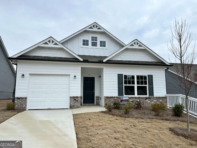 16 Wildflower Ln Unit 39, Dallas, GA 30132 - craftsman house featuring driveway, board and batten siding, and an attached garage