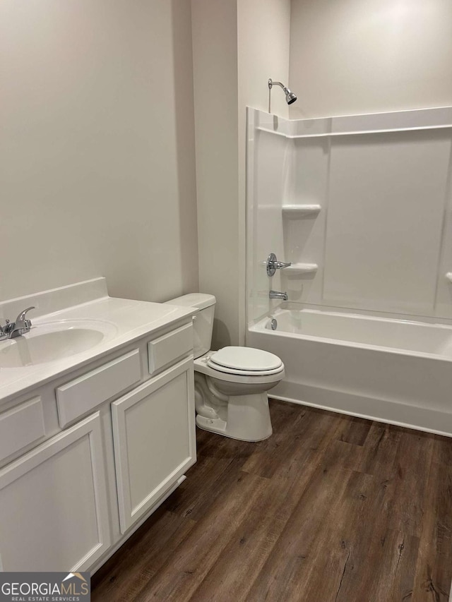 16 Wildflower Ln Unit 39, Dallas, GA 30132 - bathroom with vanity, washtub / shower combination, and wood finished floors