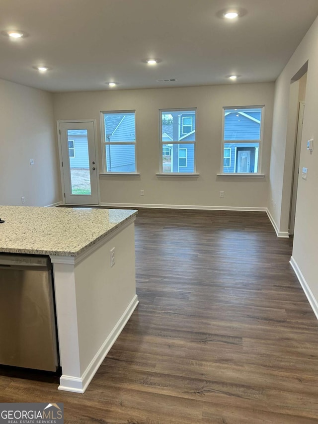 16 Wildflower Ln Unit 39, Dallas, GA 30132 - kitchen featuring stainless steel dishwasher, dark wood-style flooring, light stone counters, recessed lighting, and open floor plan