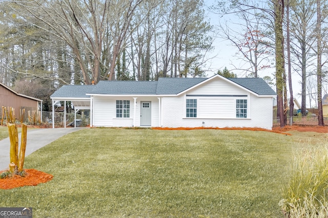 ranch-style house with a carport and a front lawn