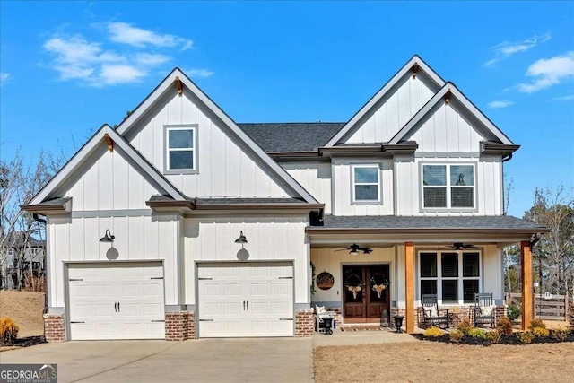 view of front of home with a garage and covered porch