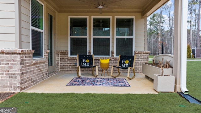 view of patio with ceiling fan