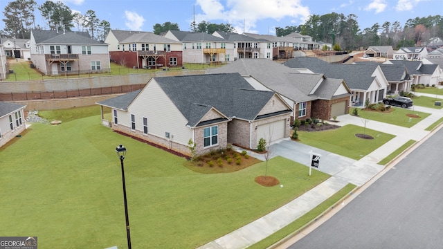 drone / aerial view with a residential view