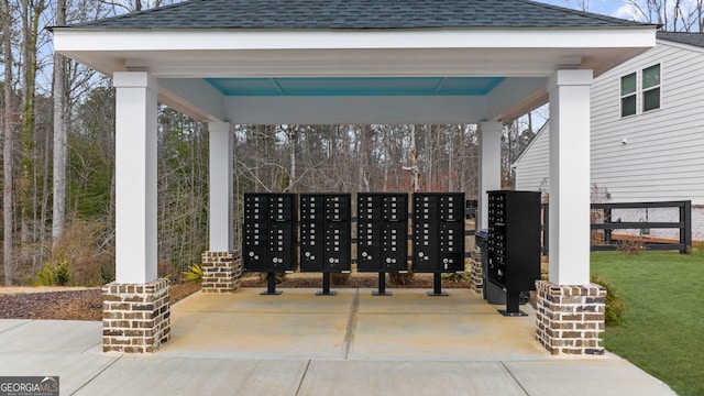 view of home's community with mail area, a carport, and a gazebo