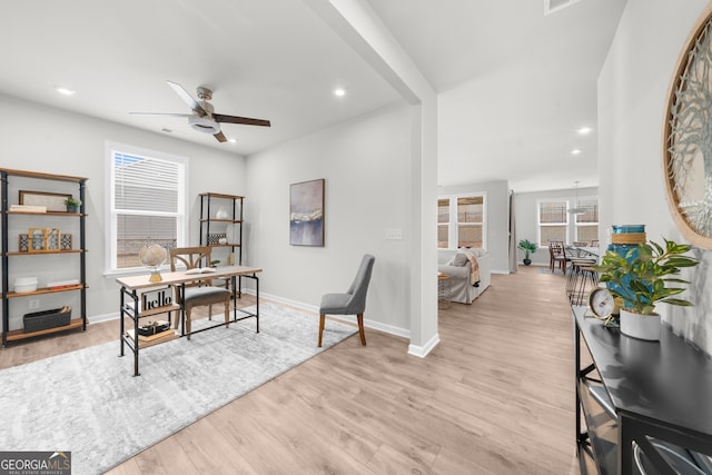 office featuring recessed lighting, ceiling fan, light wood-style flooring, and baseboards