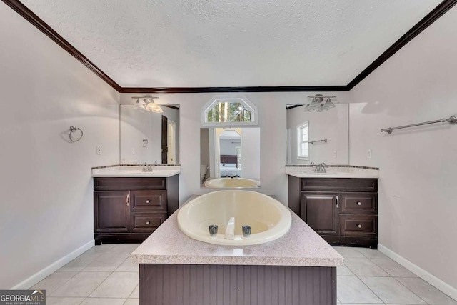 bathroom with tile patterned flooring, crown molding, a bathing tub, and vanity