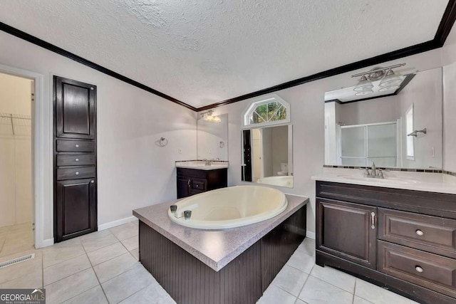 bathroom featuring crown molding, tile patterned flooring, vanity, a textured ceiling, and separate shower and tub