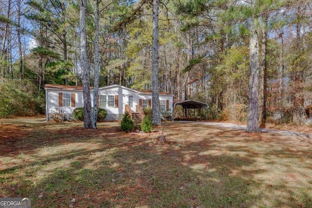 view of yard featuring a carport