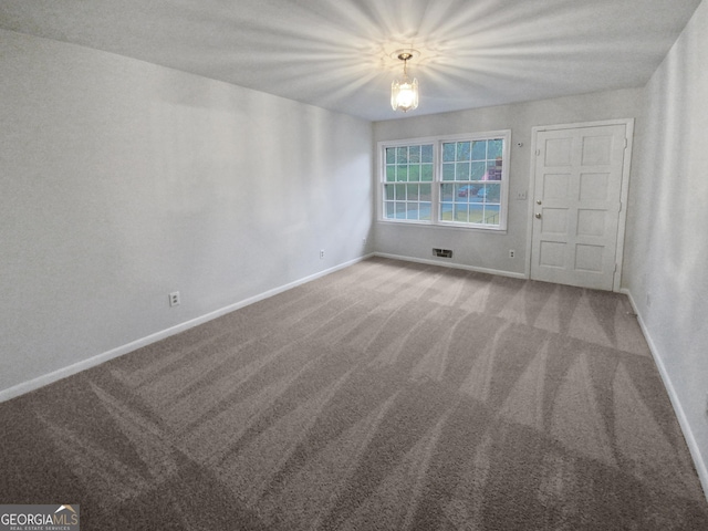 empty room with carpet floors