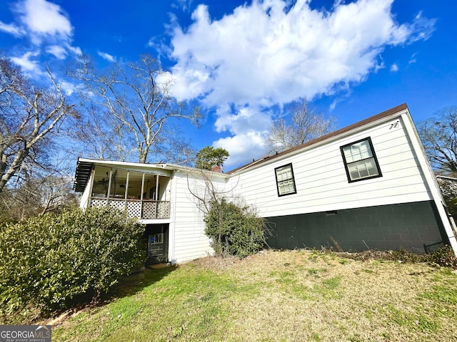 exterior space with a yard