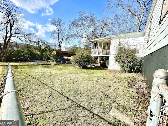 view of yard featuring a trampoline