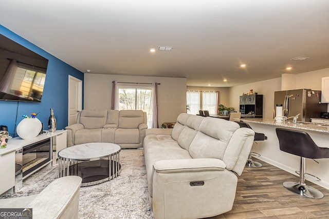 living room featuring light hardwood / wood-style flooring