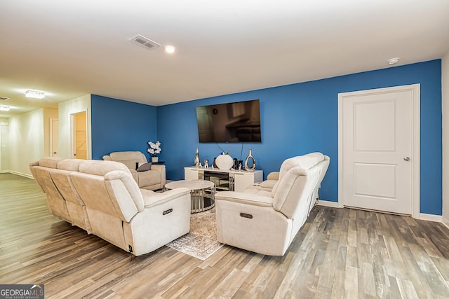 living room featuring wood-type flooring