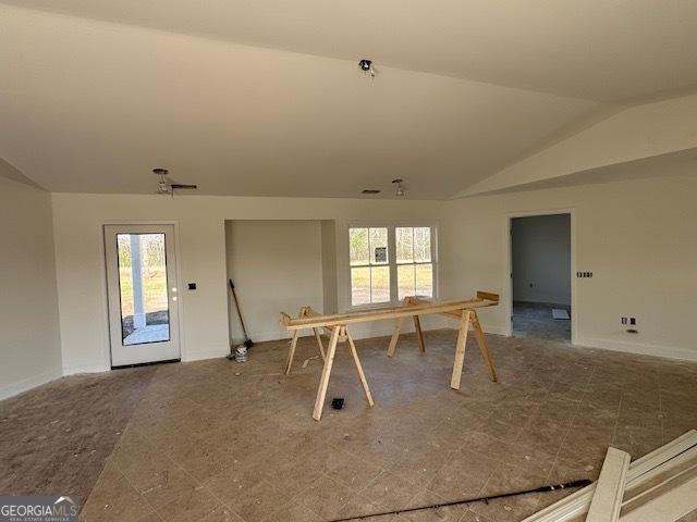 interior space featuring lofted ceiling