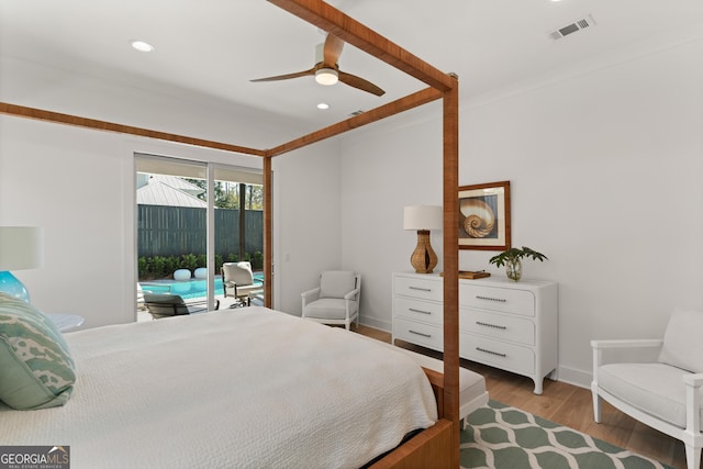 bedroom featuring access to exterior, ceiling fan, and light hardwood / wood-style flooring