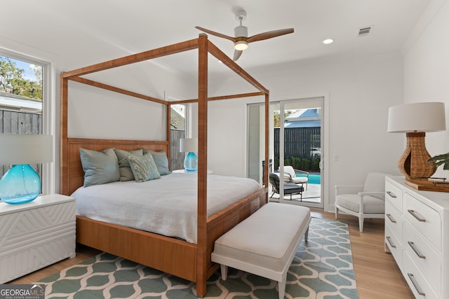 bedroom with crown molding, ceiling fan, light wood-type flooring, and access to outside